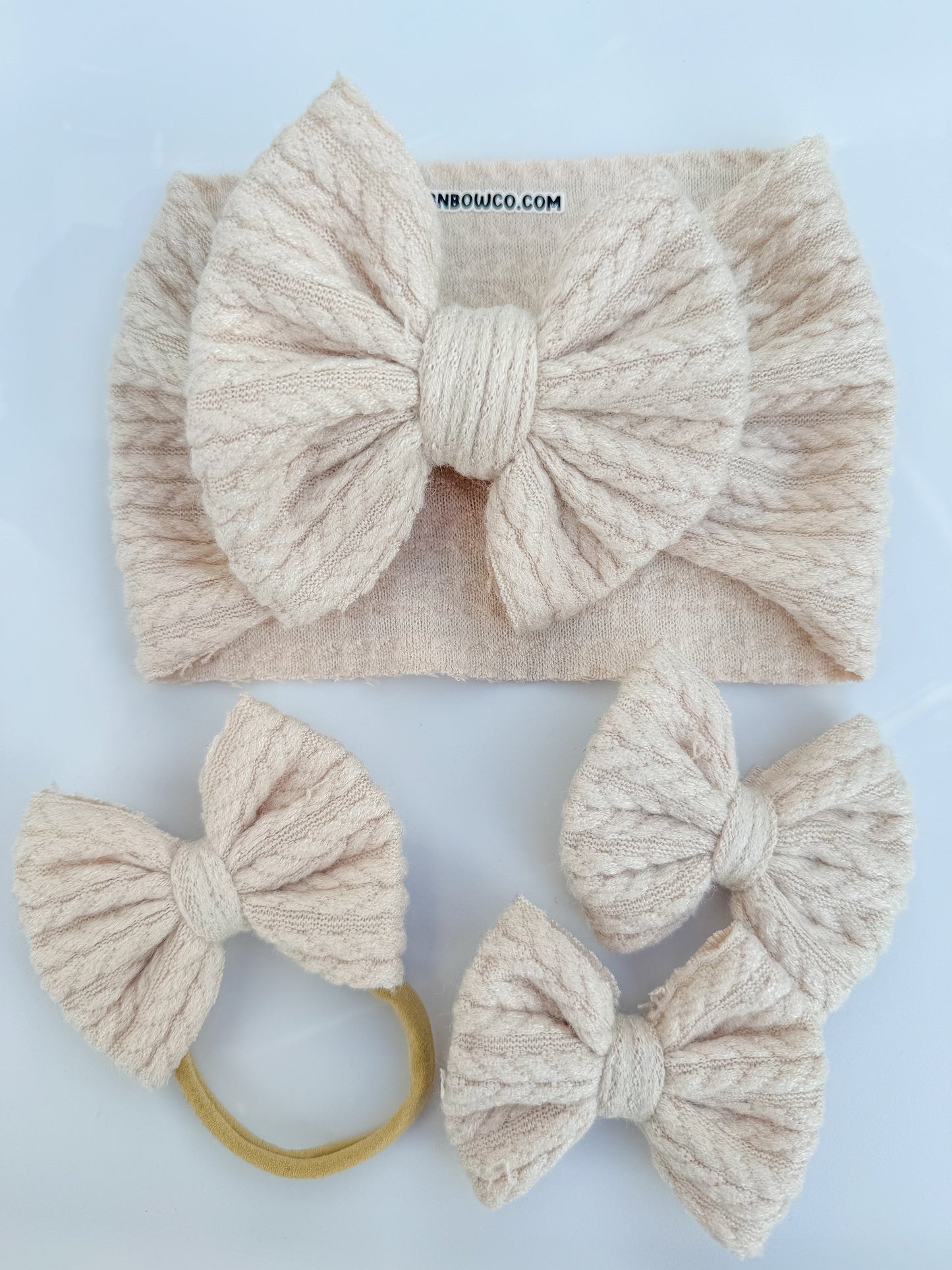 cream knit bows