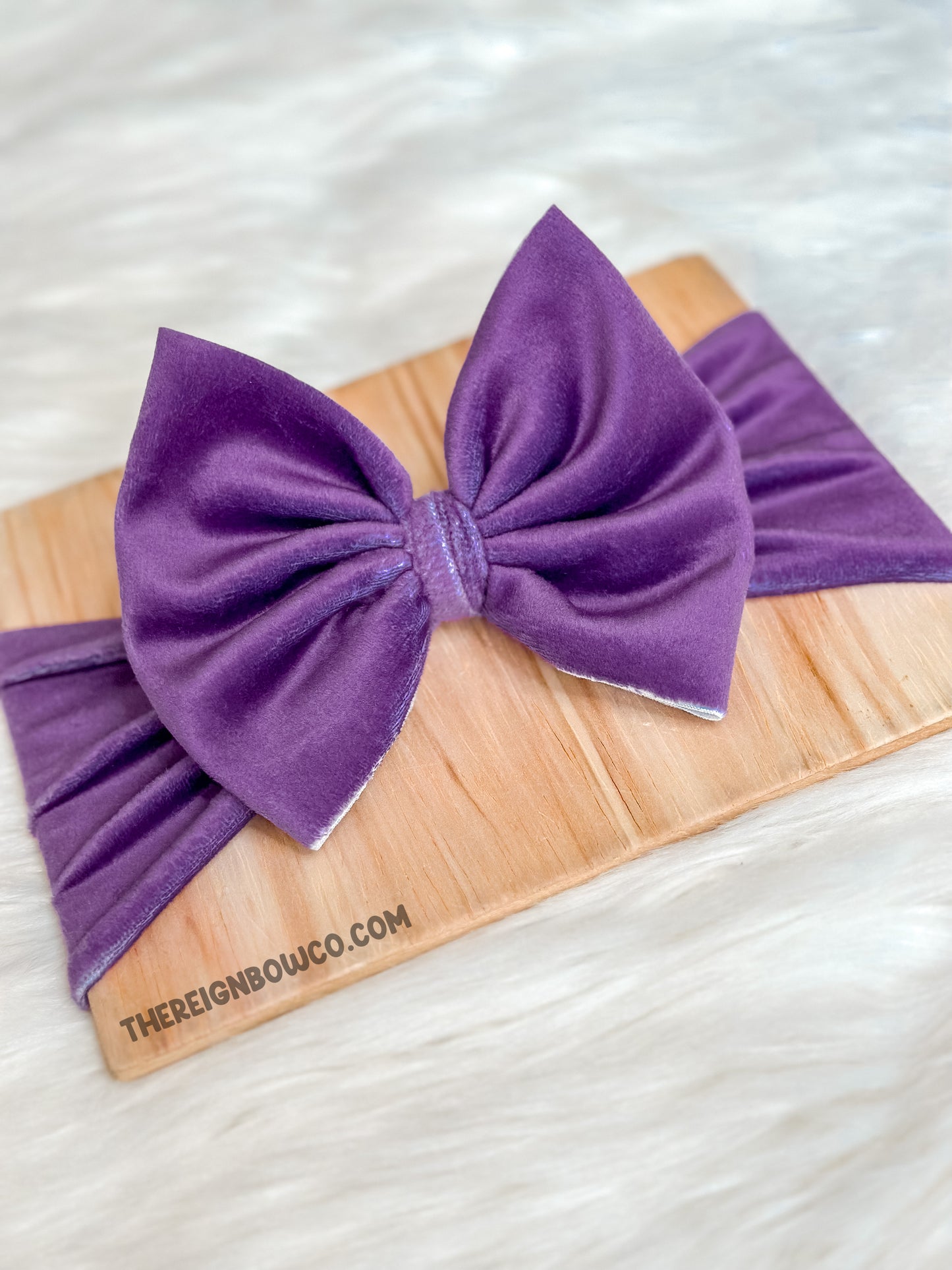 dark purple velvet bows